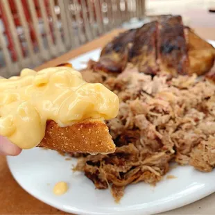 a plate of food with macaroni and cheese