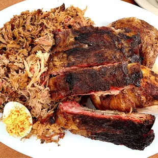 a plate of meat and rice