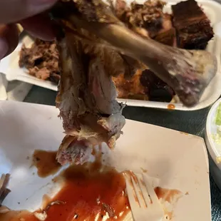 Check leg meat fell off the bone after taking a bite.