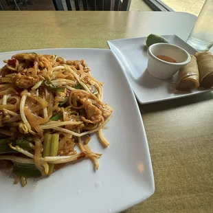 Pad Thai n egg rolls. I do recommend the egg roll sauce to be a bit spicy lemony not too sweet