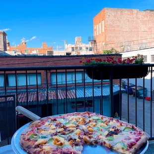 Pizza with pineapple, bacon &amp; peppers