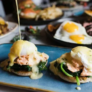 Poached Eggs Benny with house made creamy hollandaise sauce.