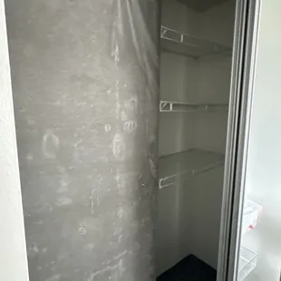 Big cement in the closet. With little room for clothes.