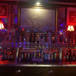 a bar with a lot of bottles