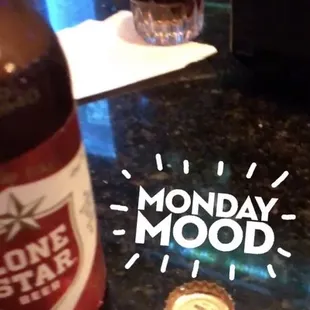 a bottle of beer on a table