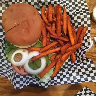 This is a 1/2 order of sweet potato fries with a burger