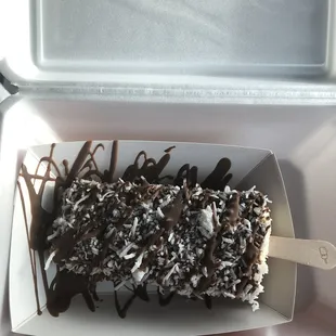 a chocolate covered ice cream bar