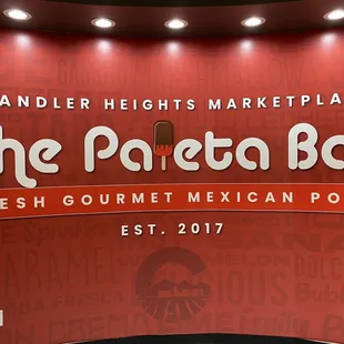 Wall logo inside store.