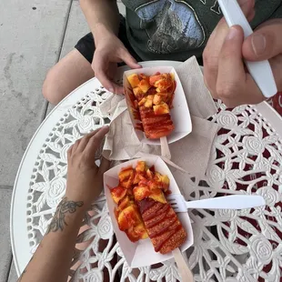 choose your own paleta + choose your dip + toppings  We got chili mango + tajin/chamoy + topped mango