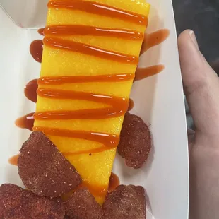 a person holding a plate of food