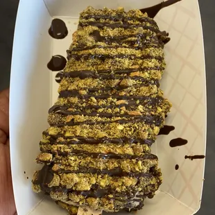 New Mexico United Paleta (Oreos &amp; Banana) dunked in dark chocolate with pistachios.