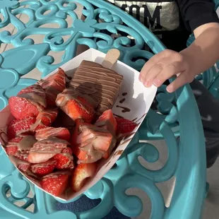 Hazelnut paleta full dip with milk chocolate, strawberries and milk chocolate drizzle. $4.97