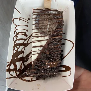 Oreos on Oreos. half dipped milk chocolate paleta bar