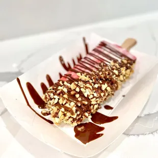 Strawberry cream cheese - with half dipped dark chocolate, drizzled chocolate, &amp; mixed nuts