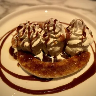Caramelized Banana Split (Vanilla ice cream, whipped cream, caramel sauce - $20)