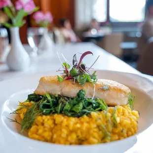 Fresh Fish, seasonal catch, sweet carrot infused risotto, sauteed spinach