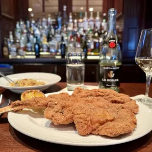 Veal Chop Milanese and Linguini aglio olio with La Scolca Black Label Gavi dei Gavi...