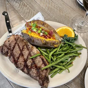 a steak and a baked potato