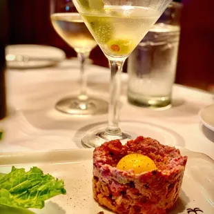 Steak tartare that needed salt and the well manner dirty martini was missing the blue cheese olives and more brine.