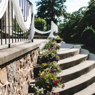 Outdoor ceremony stairs Credit: Linh P.