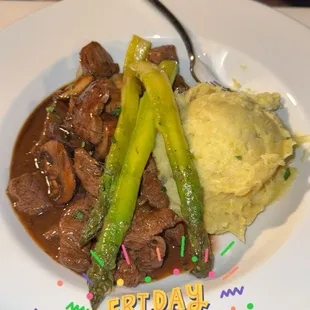 Beef frites, mashed potatoes, asparagus