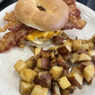 Bagel breakfast sandwich and potatoes