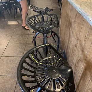 Love the tractor style seating in the bar area.