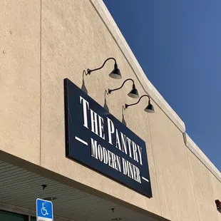 a sign for the pantry modern diner