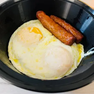 Eggs over easy and sausage sausage