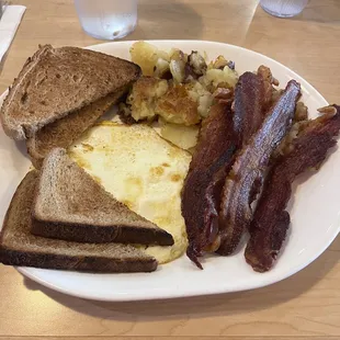 Bacon, eggs, potatoes, toast