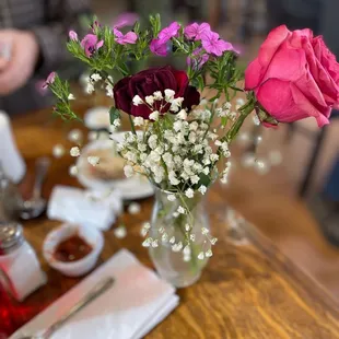 Fresh flowers on every table.