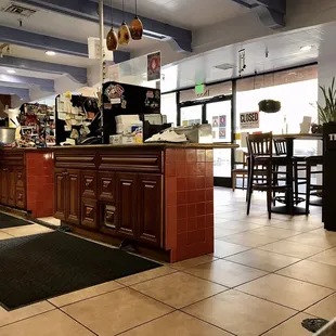 a view of the kitchen from the dining area