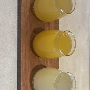 Mango, passion fruit and peach mimosa flight