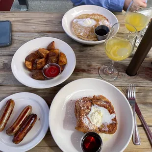 French toast, side of sausage, side of Cajun home style potatoes, buttermilk pancakes, mimosas