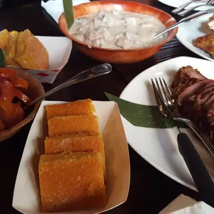 Mt. Mayon hot link medley, beef tri tip, mama leah's coconut beef, Mt. Taal chicken &amp; Anne's cornbread bibingka.
