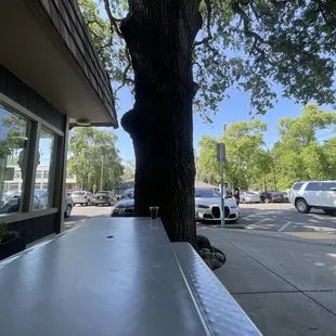 The table outside next to The Parlor Ice