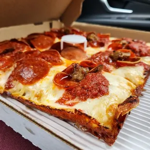 a slice of pepperoni pizza