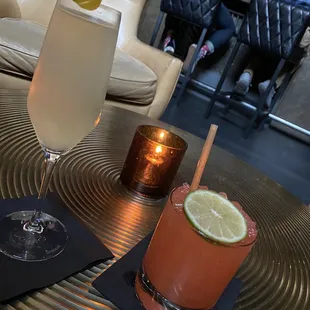 two cocktails on a table