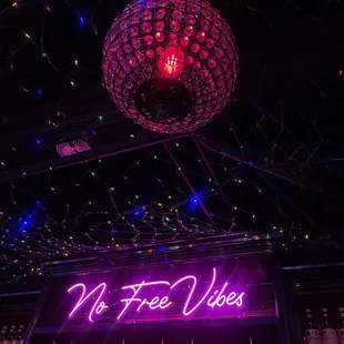 a disco ball and neon lights