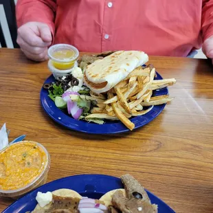 Gyro platter with fries. The fries are perfect and the Taziki sauce is top notch.