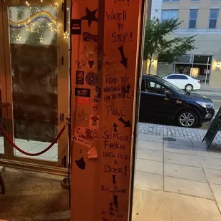 a door with stickers on it
