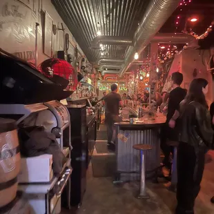 a group of people at a bar