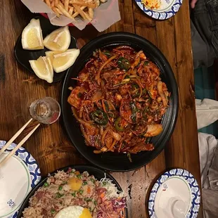 Garlic fries,  pork belly + squid stir fry Bacon fried rice