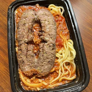 Linguine with meat sauce and sausage. Pasta good, sausage horrible