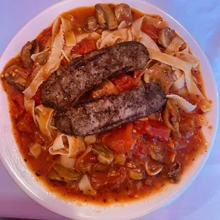 Fettuccine with spicy mushroom sauce and sausage