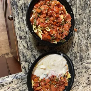 Top: penne with red sauce.. more like penne with salsa  Bottom: tortellini with mixed Alfredo red sauce aka tortellini with salsa and Mayo