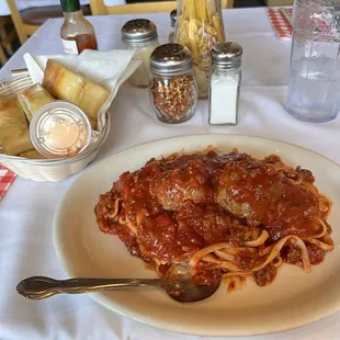 Meat sauce linguine with meatballs.