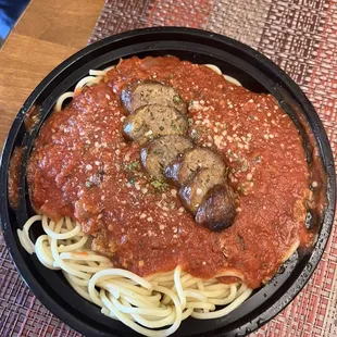 Spaghetti with meat sauce + sausage for upcharge