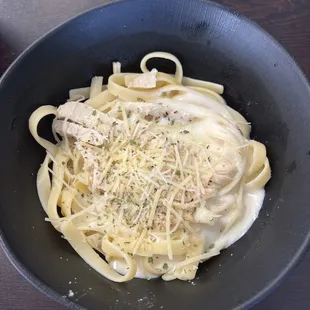 Small bowl of fettuccine Alfredo.