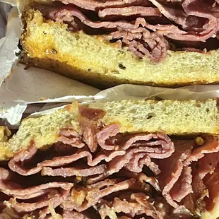 Half Pastrami Reuben on Sliced Sour Rye...